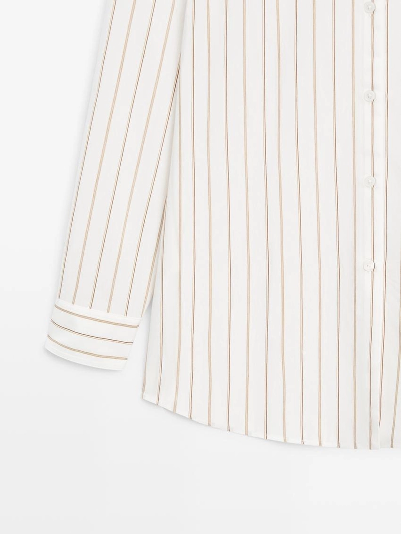 Рубашка в полоску белого цвета