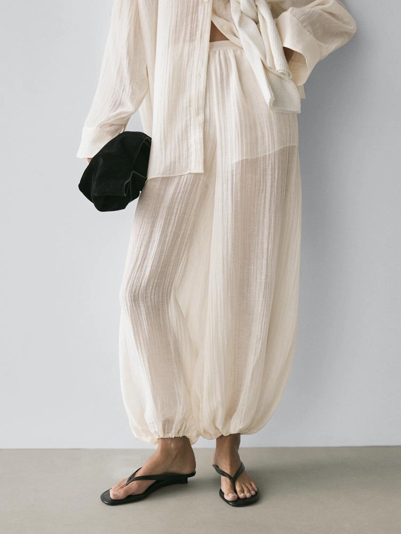 Брюки-саруэль flowing с деталями в складку