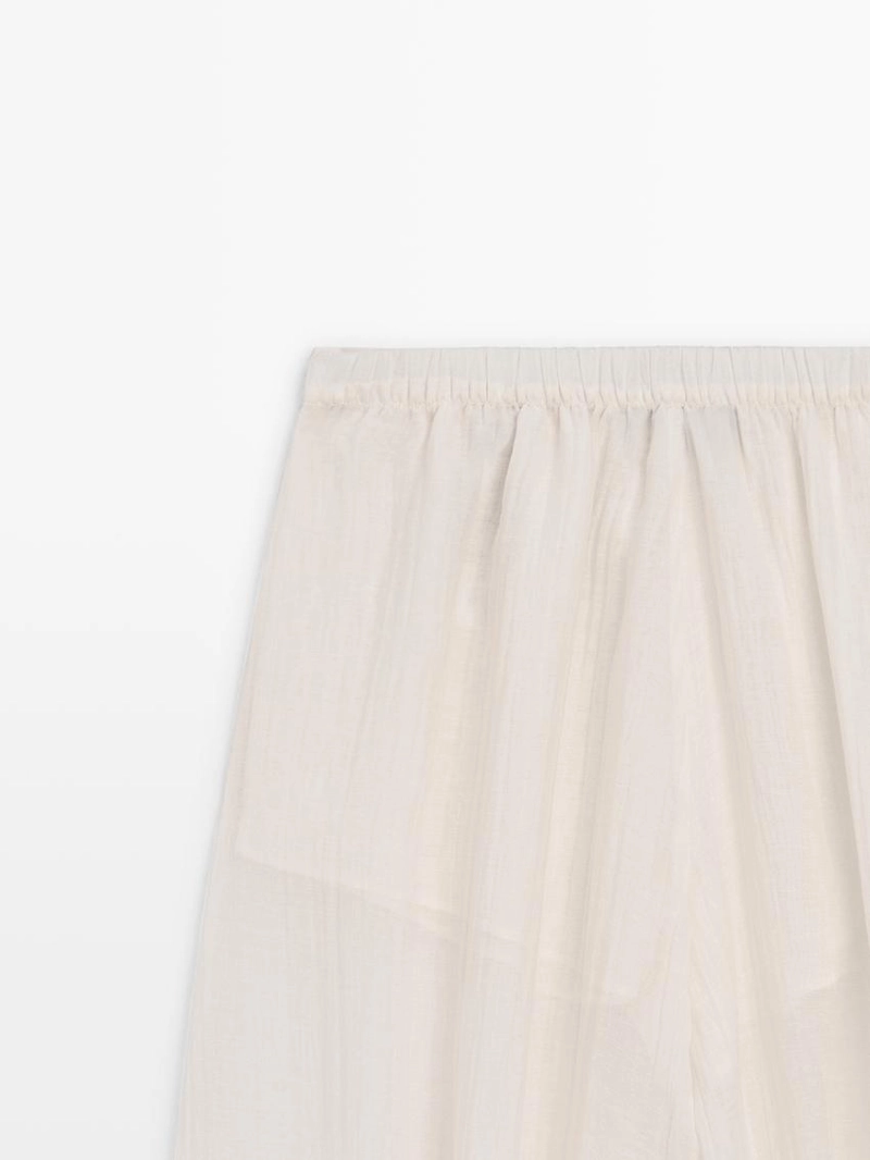 Брюки-саруэль flowing с деталями в складку