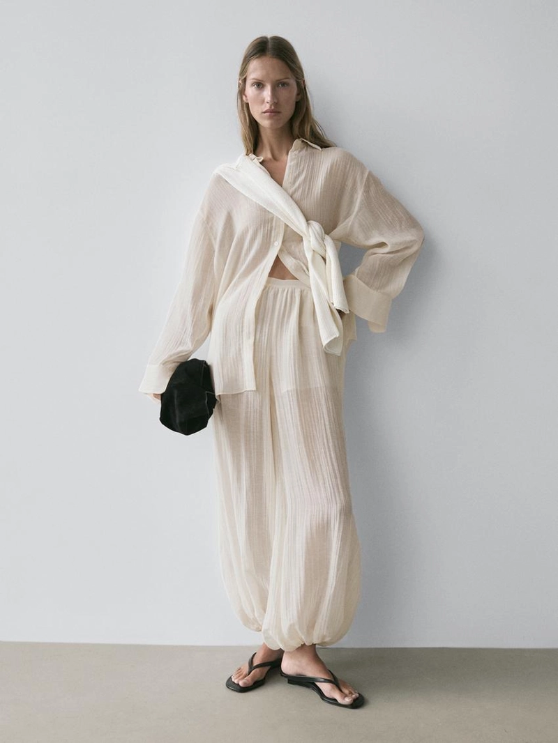 Брюки-саруэль flowing с деталями в складку