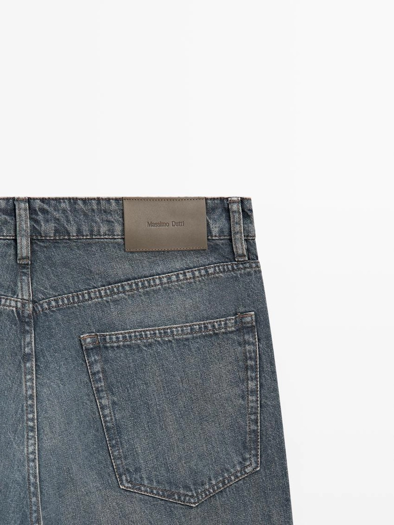 Джинсы с зауженным кроем