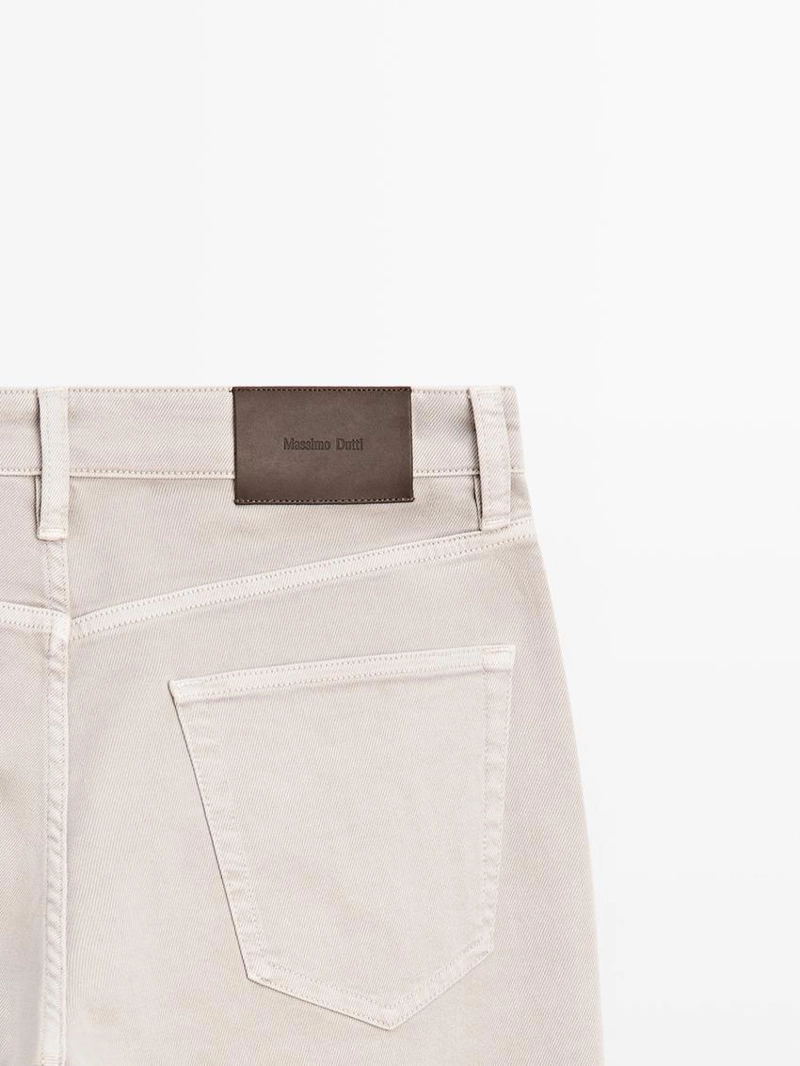 Джинсы с зауженным кроем