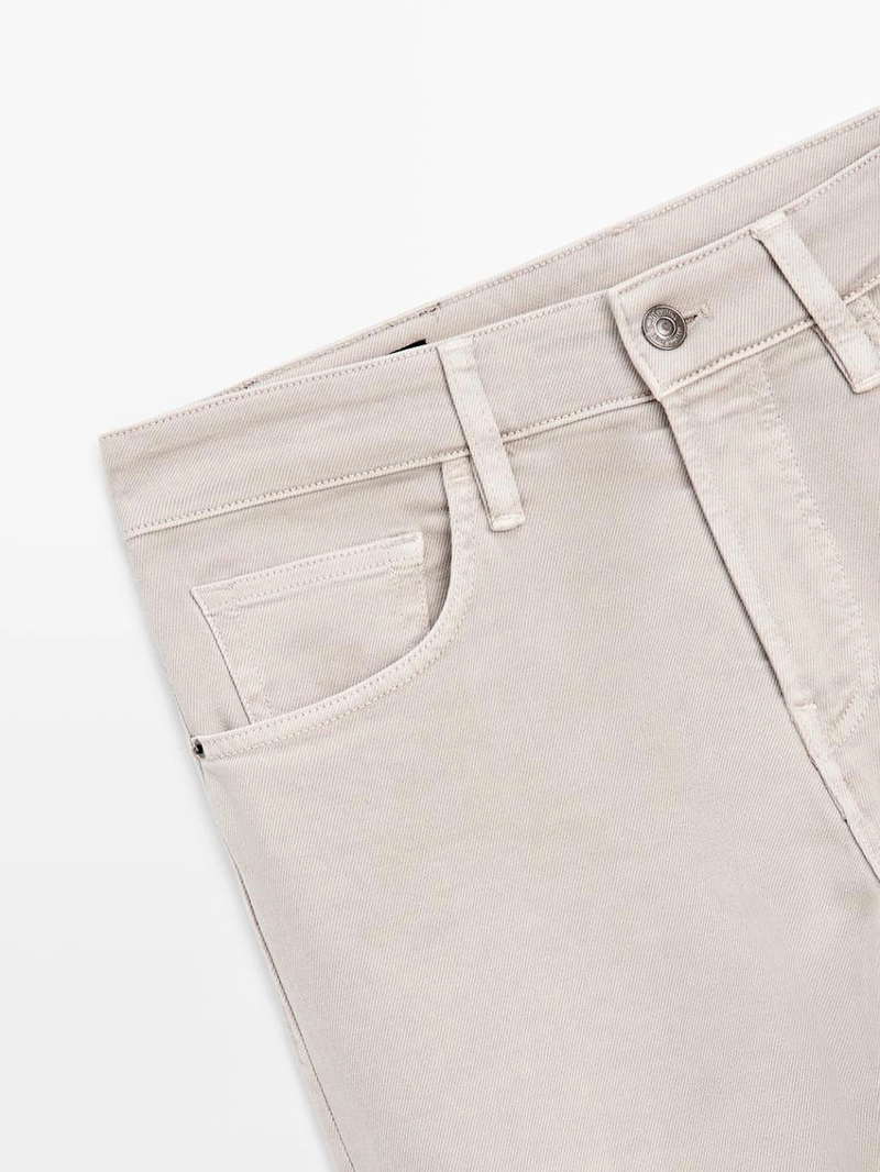 Джинсы с зауженным кроем