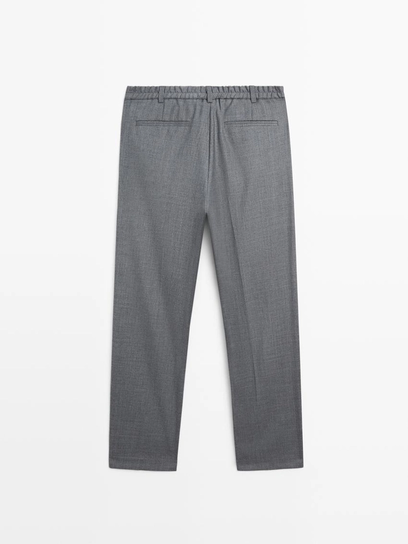 Брюки из шерсти свободного кроя с деталями вытачек