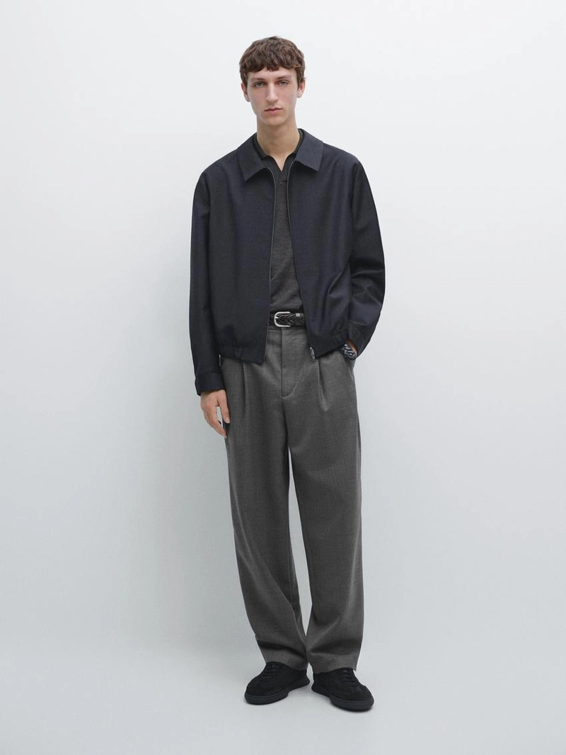 Брюки из шерсти свободного кроя с деталями вытачек