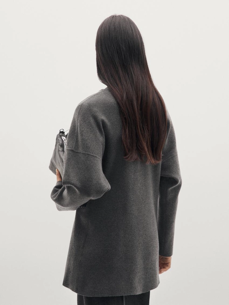 Длинный вязаный кардиган с круглым вырезом