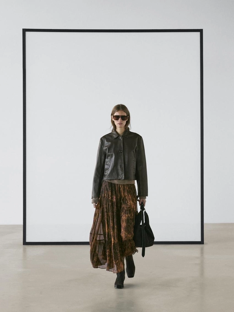 Плавная асимметричная юбка до середины икры