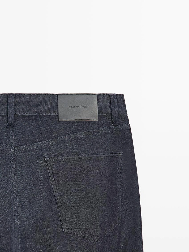 Джинсы легкого slim-fit с отбеленной отделкой