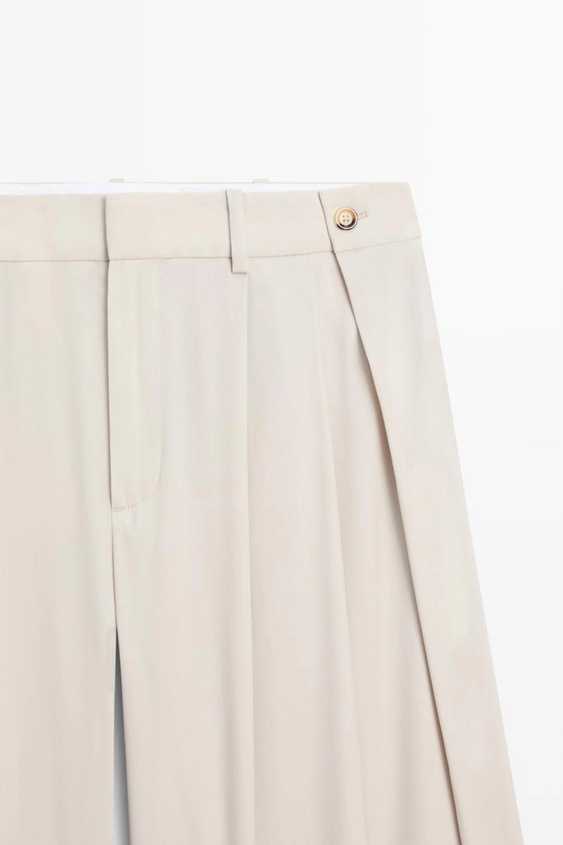 Брюки из шерстяной смеси с защипами и пуговицами