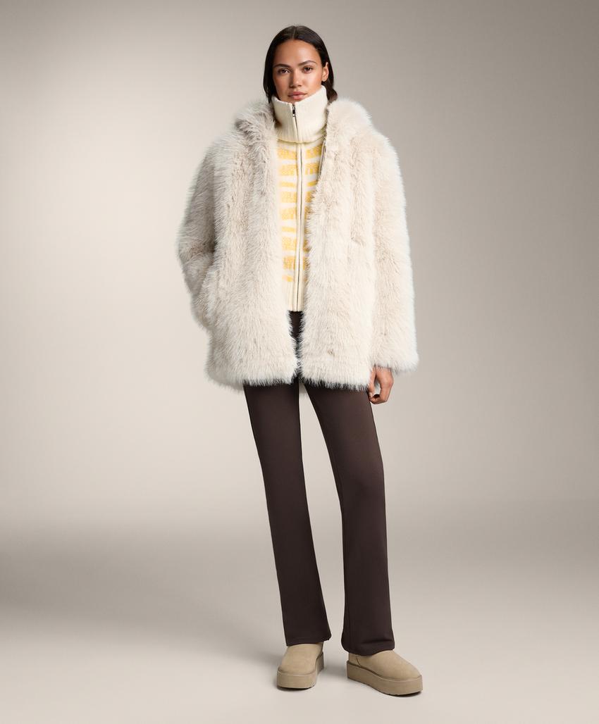 Casaco de malha jacquard às riscas