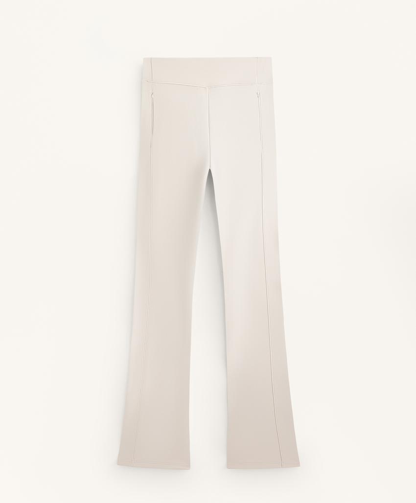 Теплые брюки с высокой посадкой и утянутыми штанинами с карманами