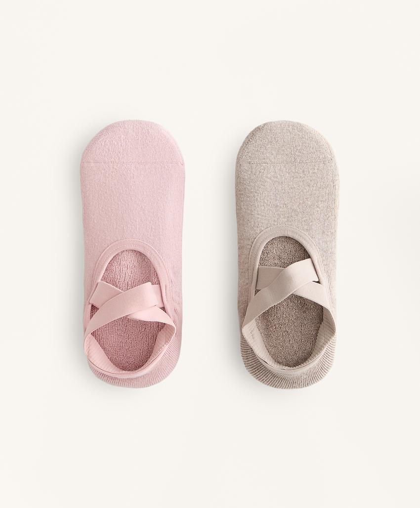 2 pairs of cotton blend yoga and Pilates socks with crossover straps
