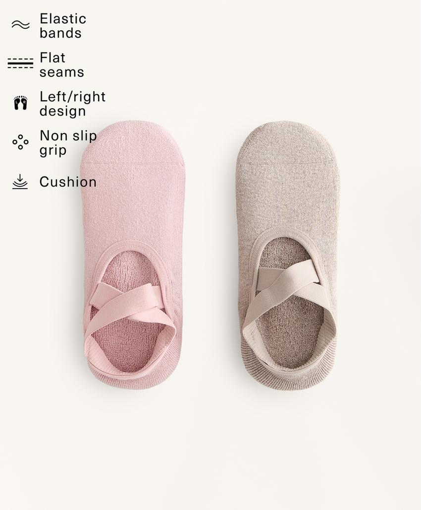 2 pairs of cotton blend yoga and Pilates socks with crossover straps