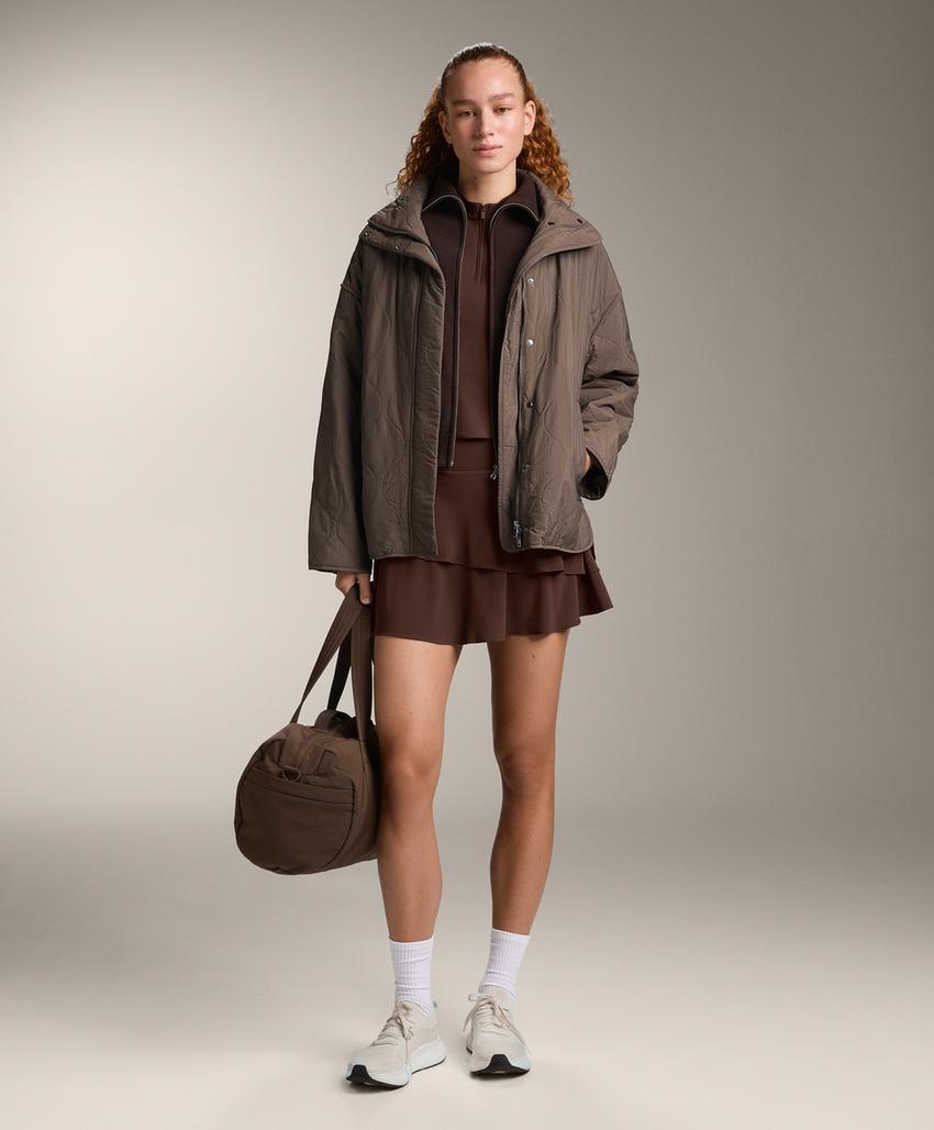 Футболка без рукавов на молнии до середины груди