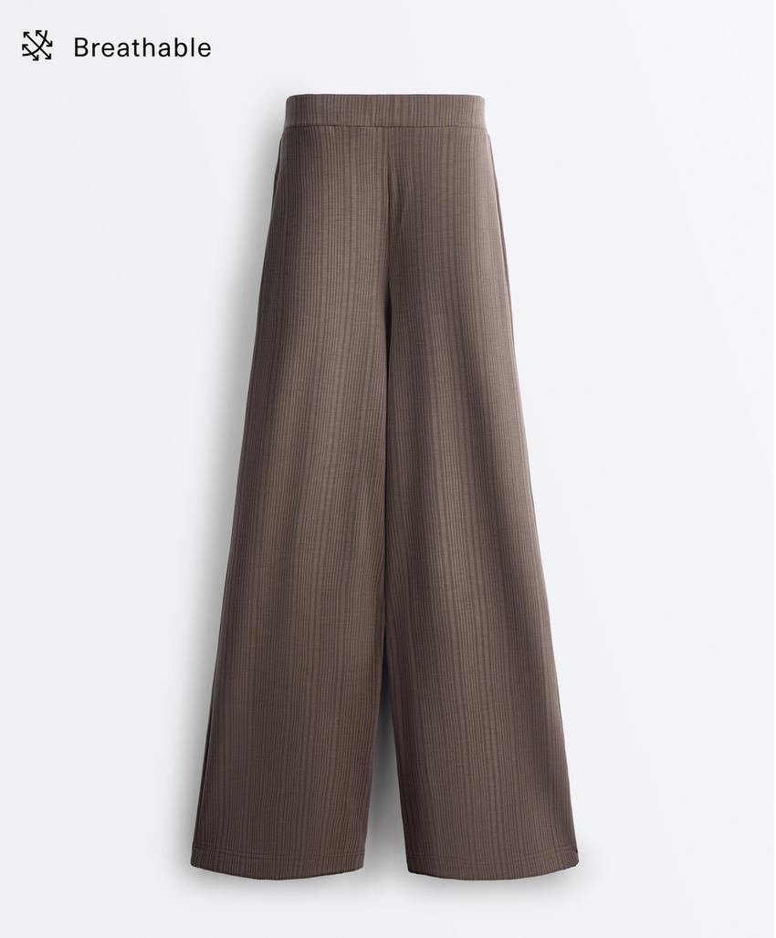 Прямые брюки с асимметричной полоской из модала