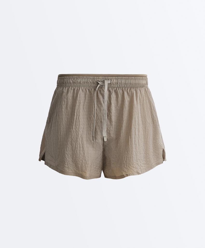 Высокотехнологичные шорты 2 в 1 с эффектом клетки