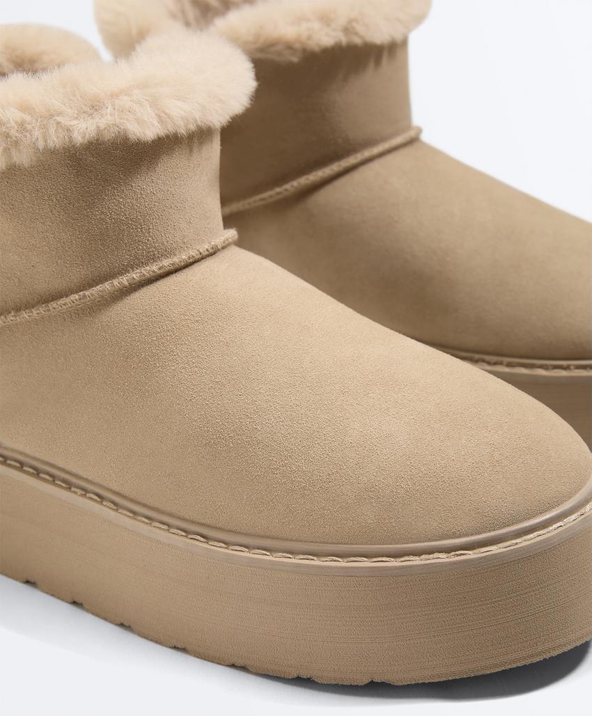 Ботинки-ботильоны на платформе из кожи