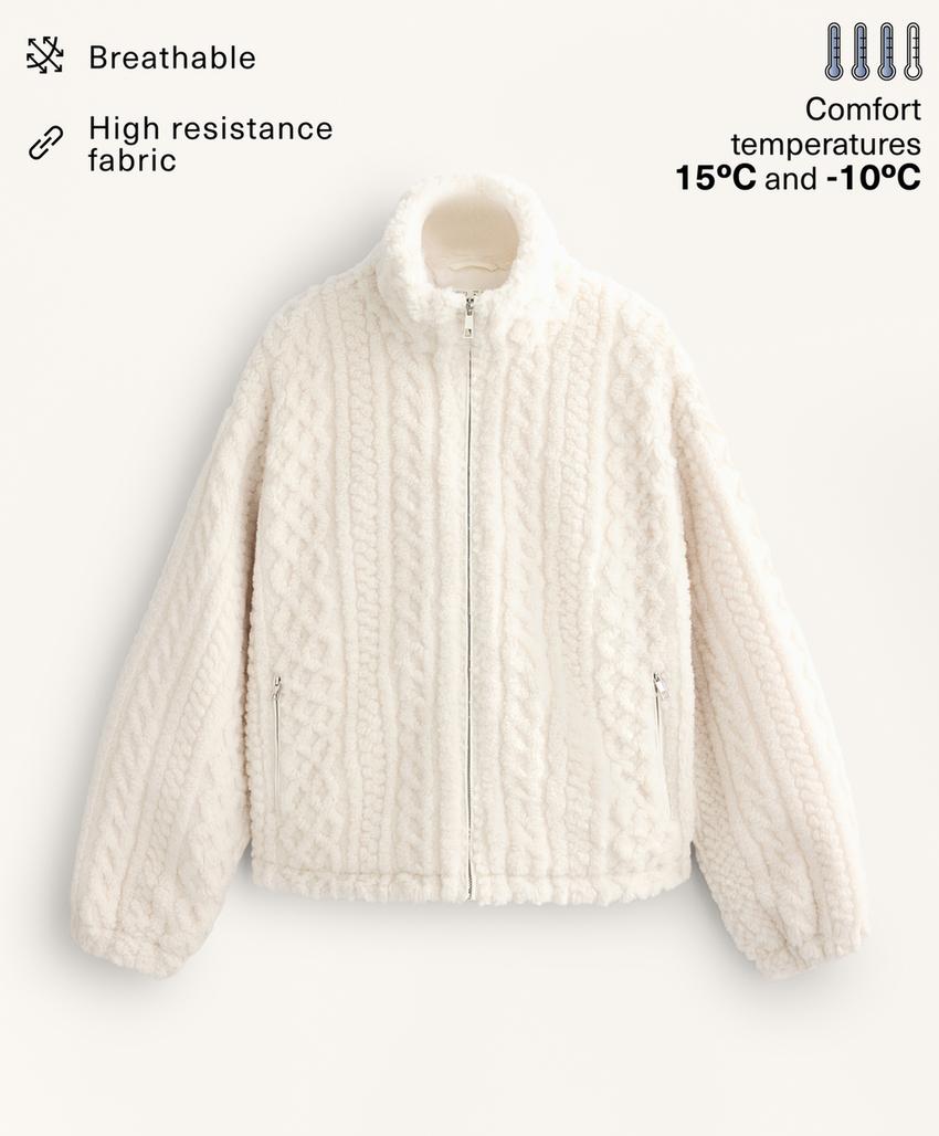 Пальто-жаккард из искусственной овчины с косами доставим в рф