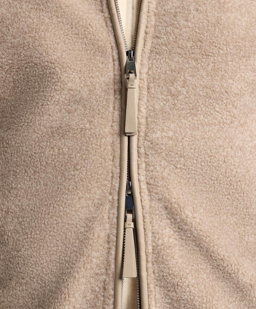 Длинный псевдо-овчинный пальто