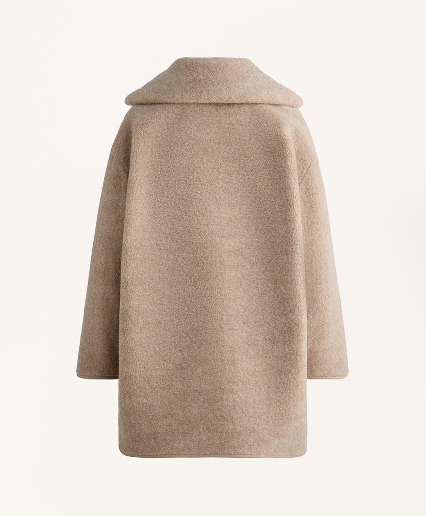 Длинный псевдо-овчинный пальто