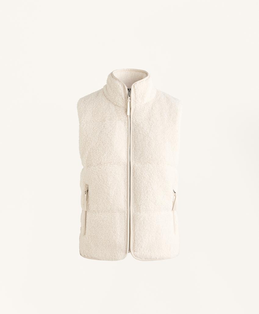 Жилет из стеганого меха искусственного