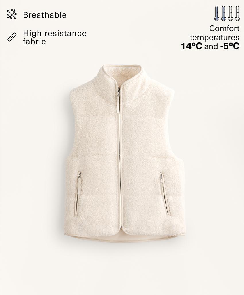 Жилет из стеганого меха искусственного