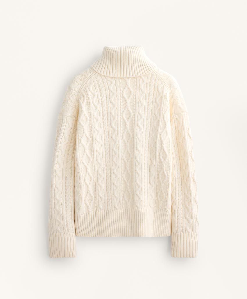 Джемпер с крупной вязкой и высоким воротником