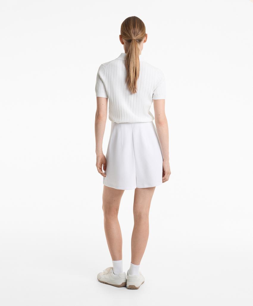 Поло с коротким рукавом из пробивного вязаного полотна