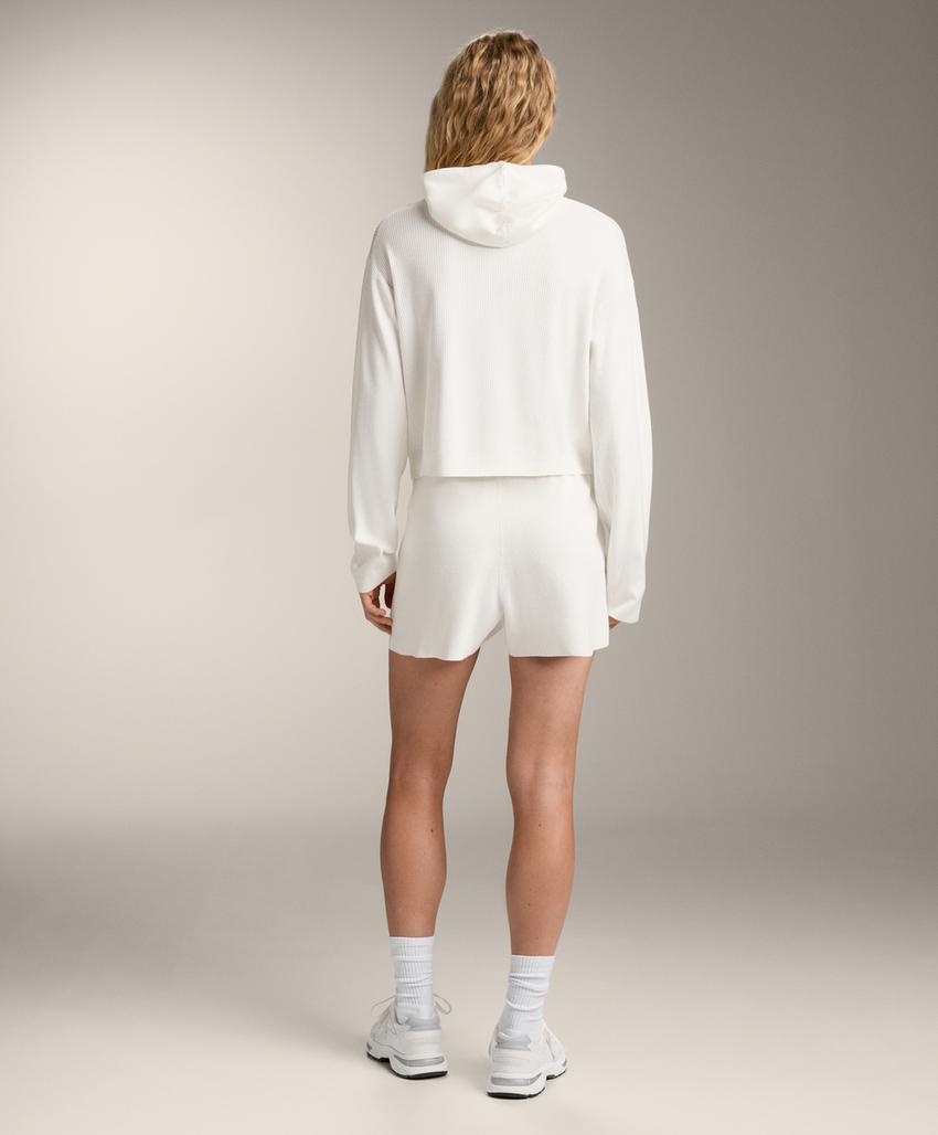 Шорты из вязаного хлопка с эффектом потертости