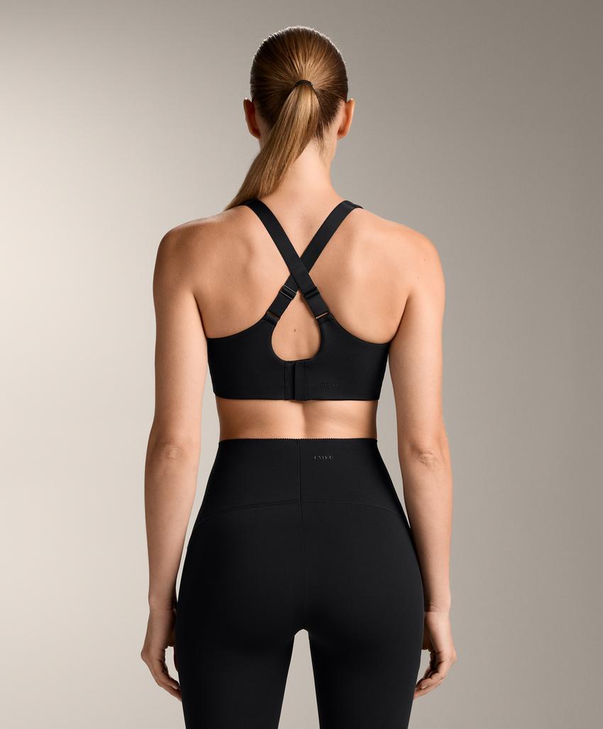 Compressive firm support cross-back sports bra