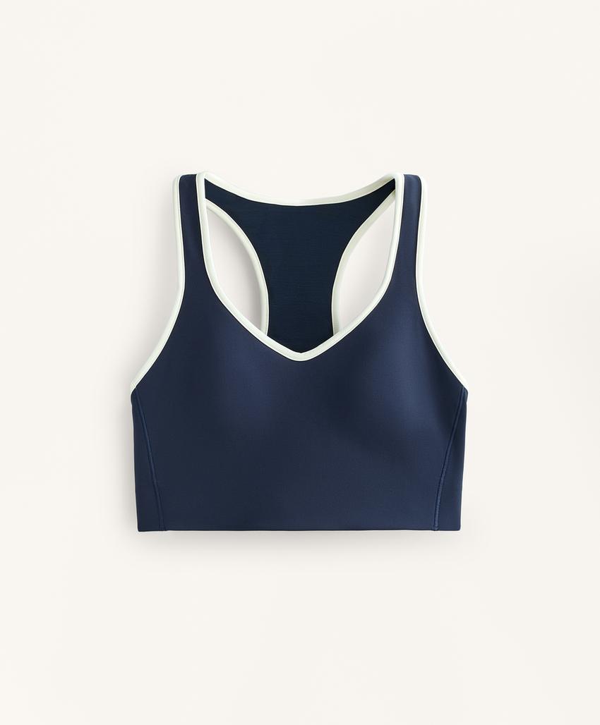 Compressive medium support sports bra with rubber cups