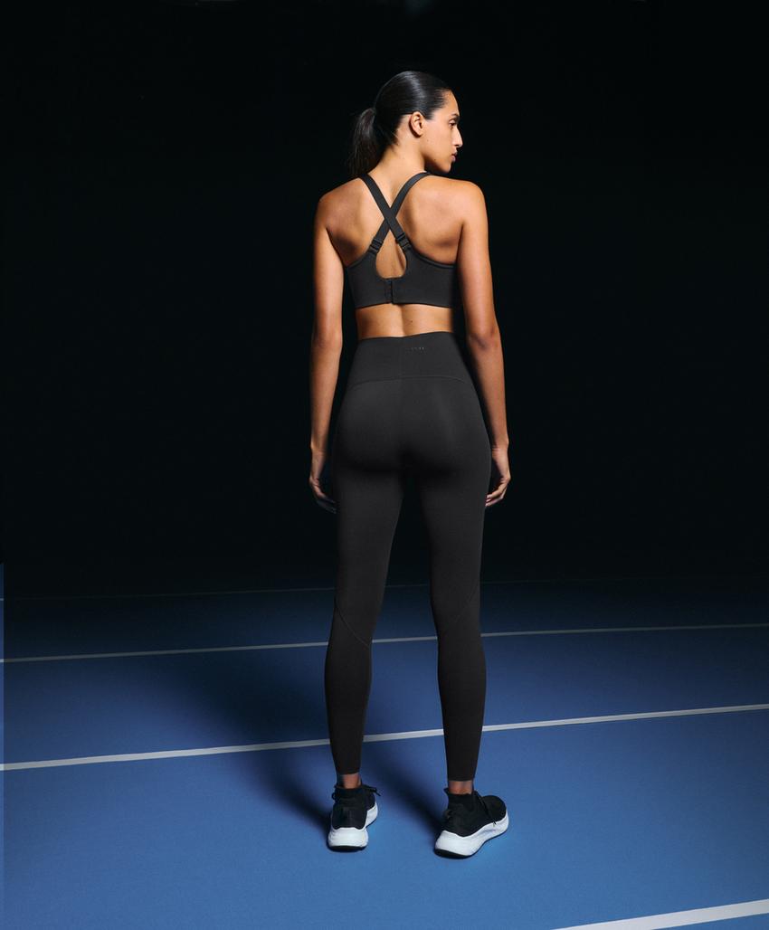 Compressive firm support cross-back sports bra