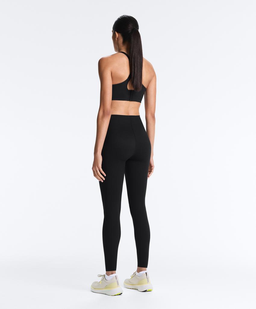 Compressive firm support cross-back sports bra