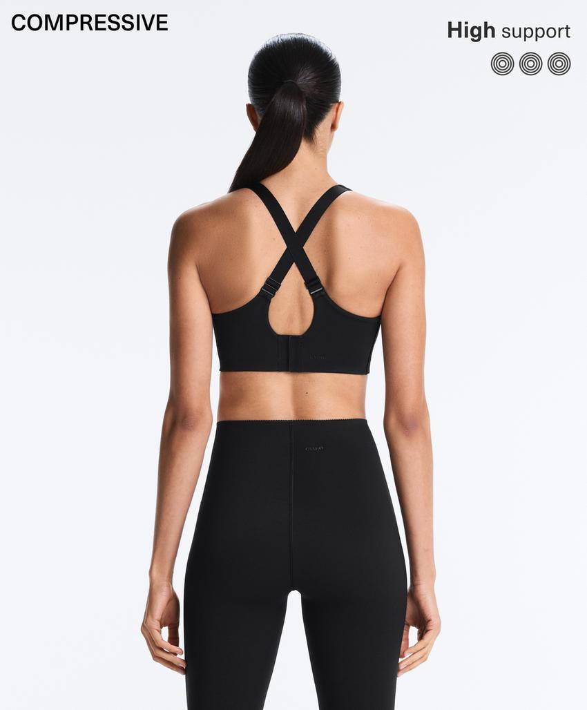 Compressive firm support cross-back sports bra