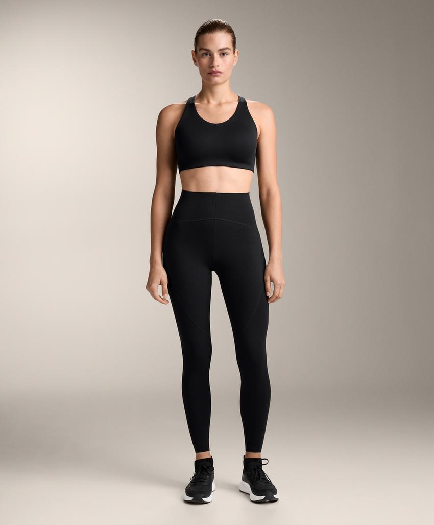 Compressive firm support cross-back sports bra