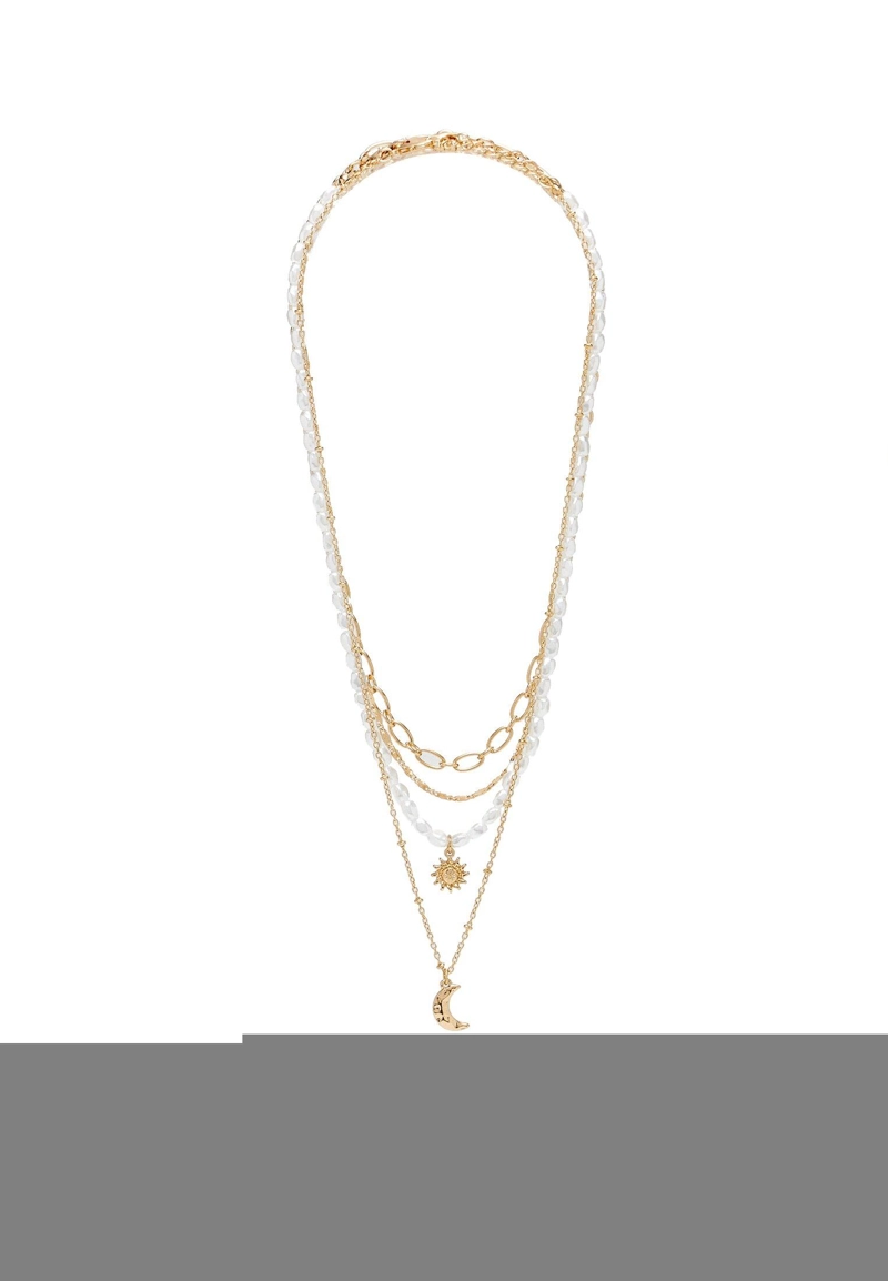 Набор из четырех ожерелий с подвесками “Луна” и “Солнце”