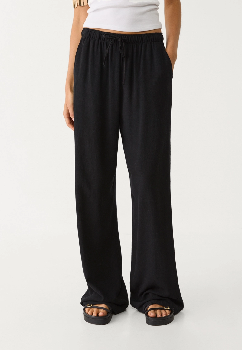 Брюки свободного кроя из смесового льна