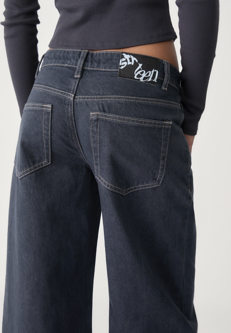 Джинсы свободного кроя