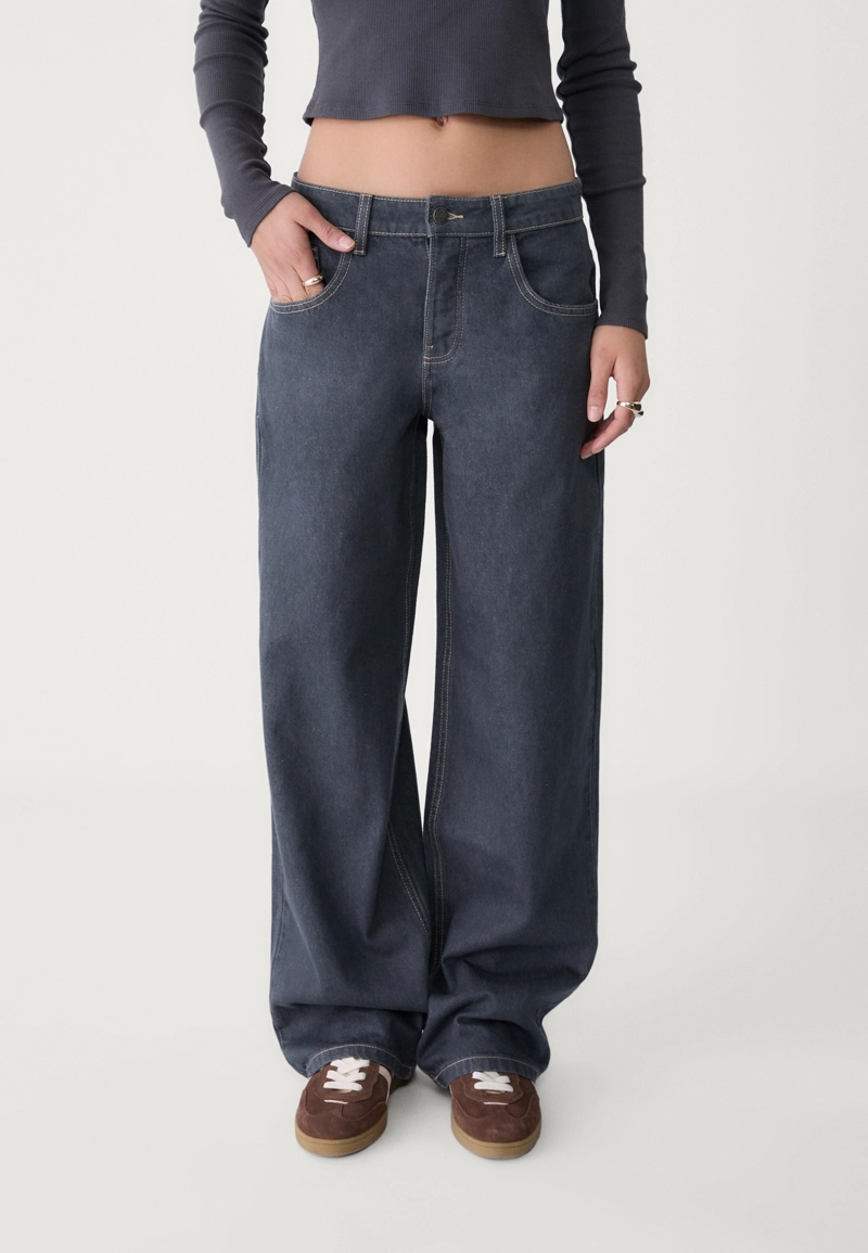 Джинсы свободного кроя