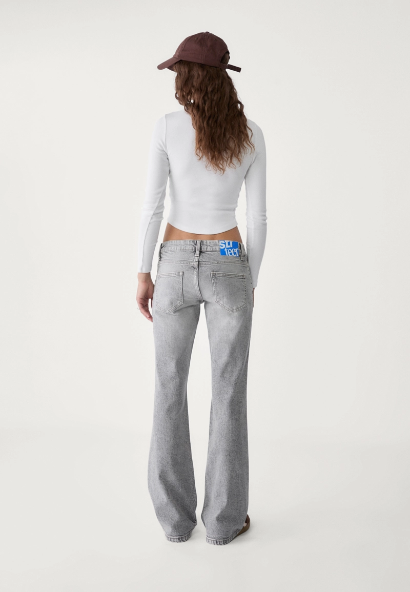 Расклешенные джинсы с низкой посадкой