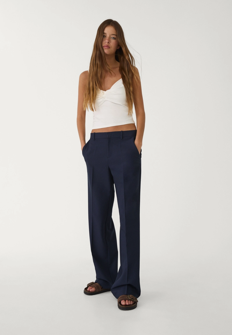 Классические брюки с карманами