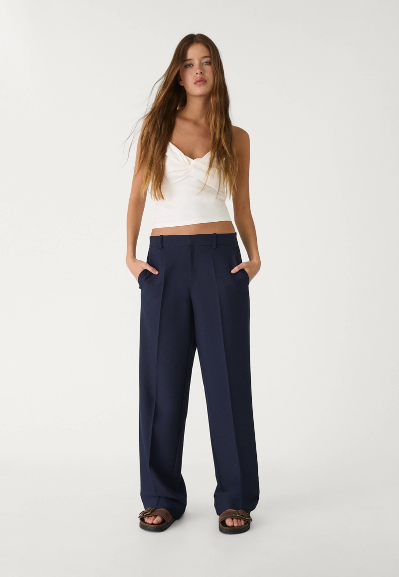 Классические брюки с карманами