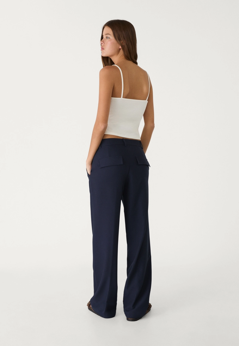 Классические брюки с карманами