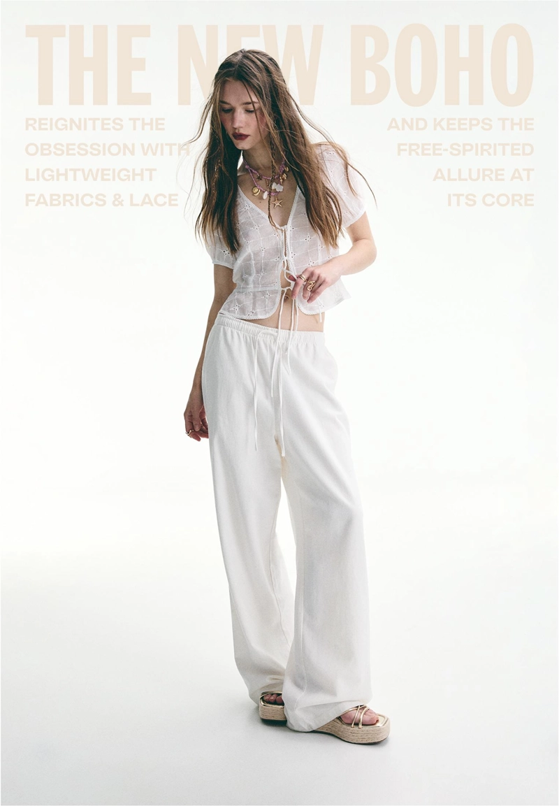 Струящаяся блуза с вышивкой и узлами