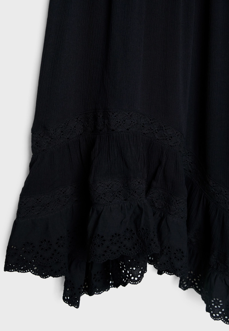 Юбка миди асимметричного кроя с воланами