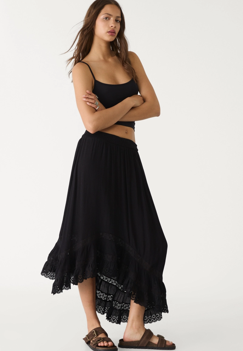 Юбка миди асимметричного кроя с воланами