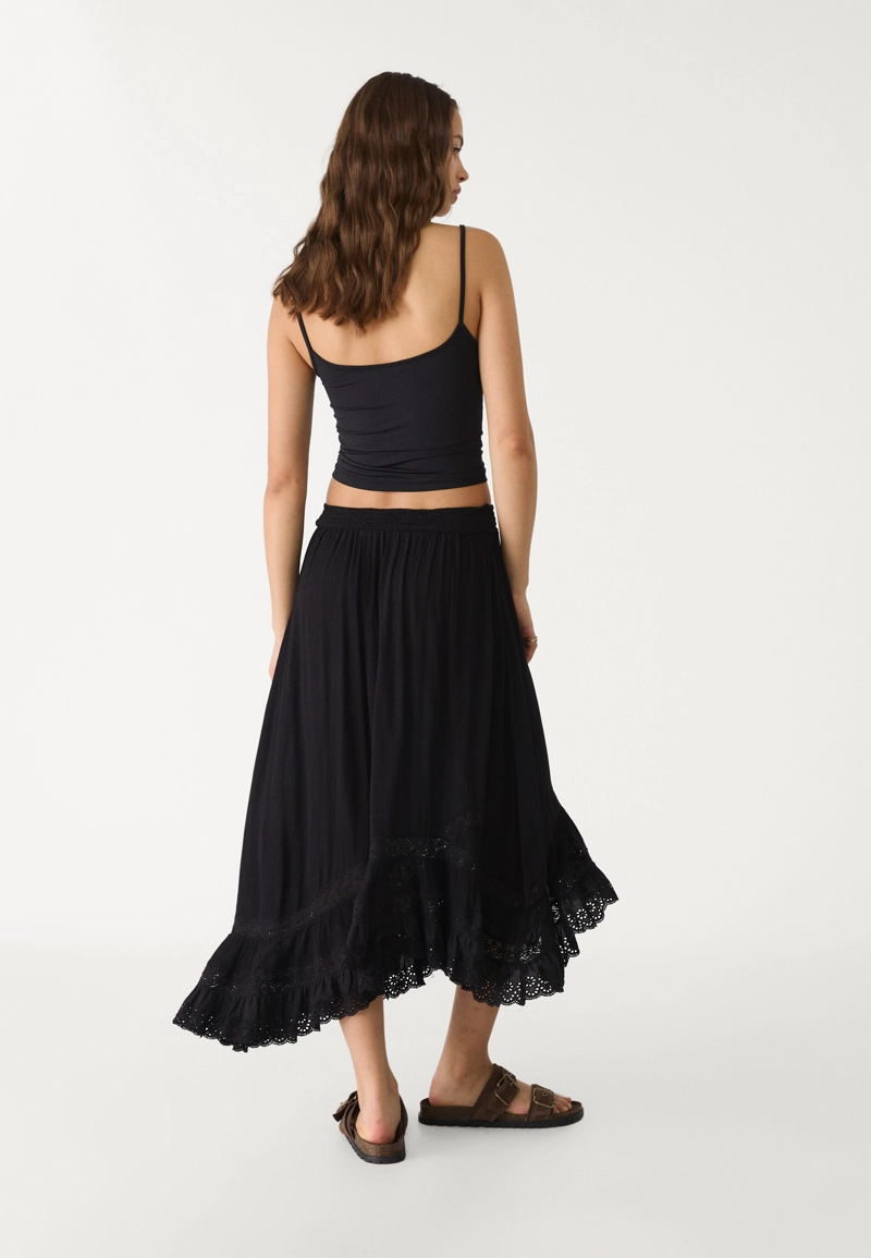 Юбка миди асимметричного кроя с воланами