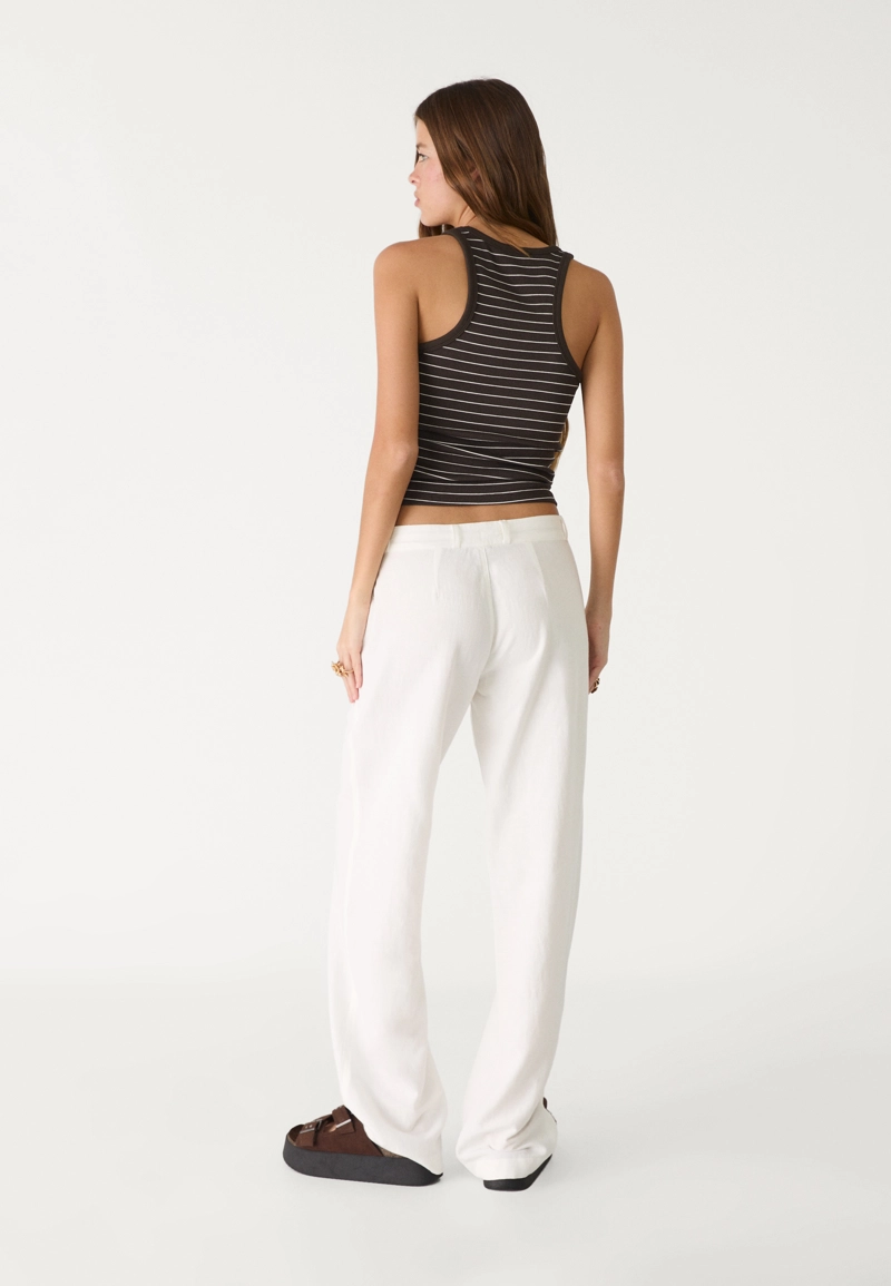 Брюки с карманом из льна