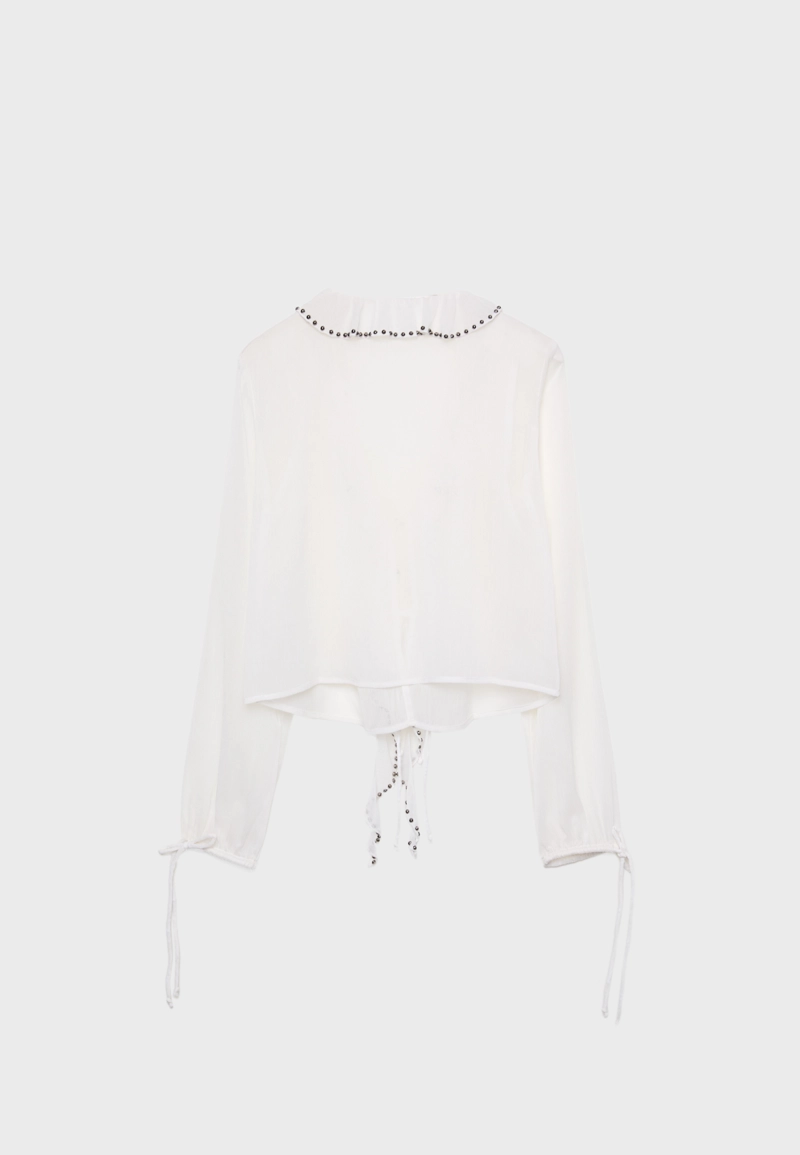 Блузка с вышивкой, воланами и заклепками