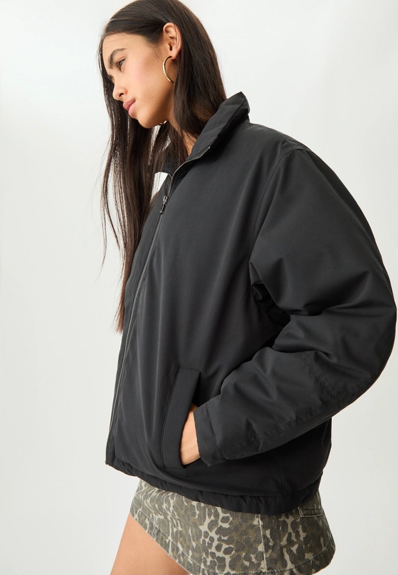 Стеганая куртка с высоким воротником